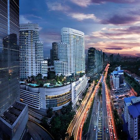 Hilton Kuala Lumpur Hotel Exterior photo The complex at night