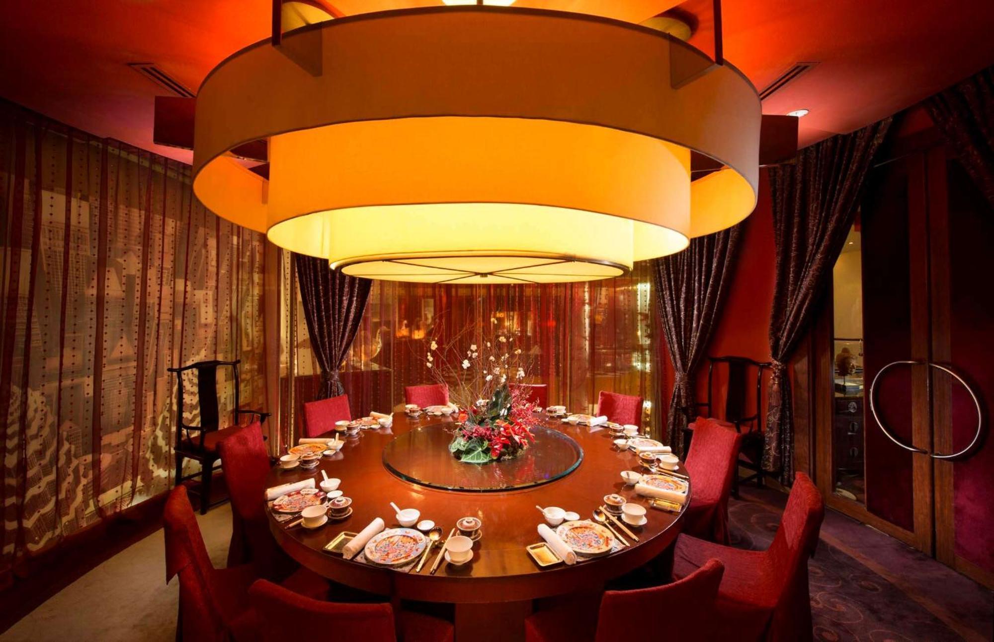 Hilton Kuala Lumpur Hotel Exterior photo A private dining room at a restaurant in Hong Kong