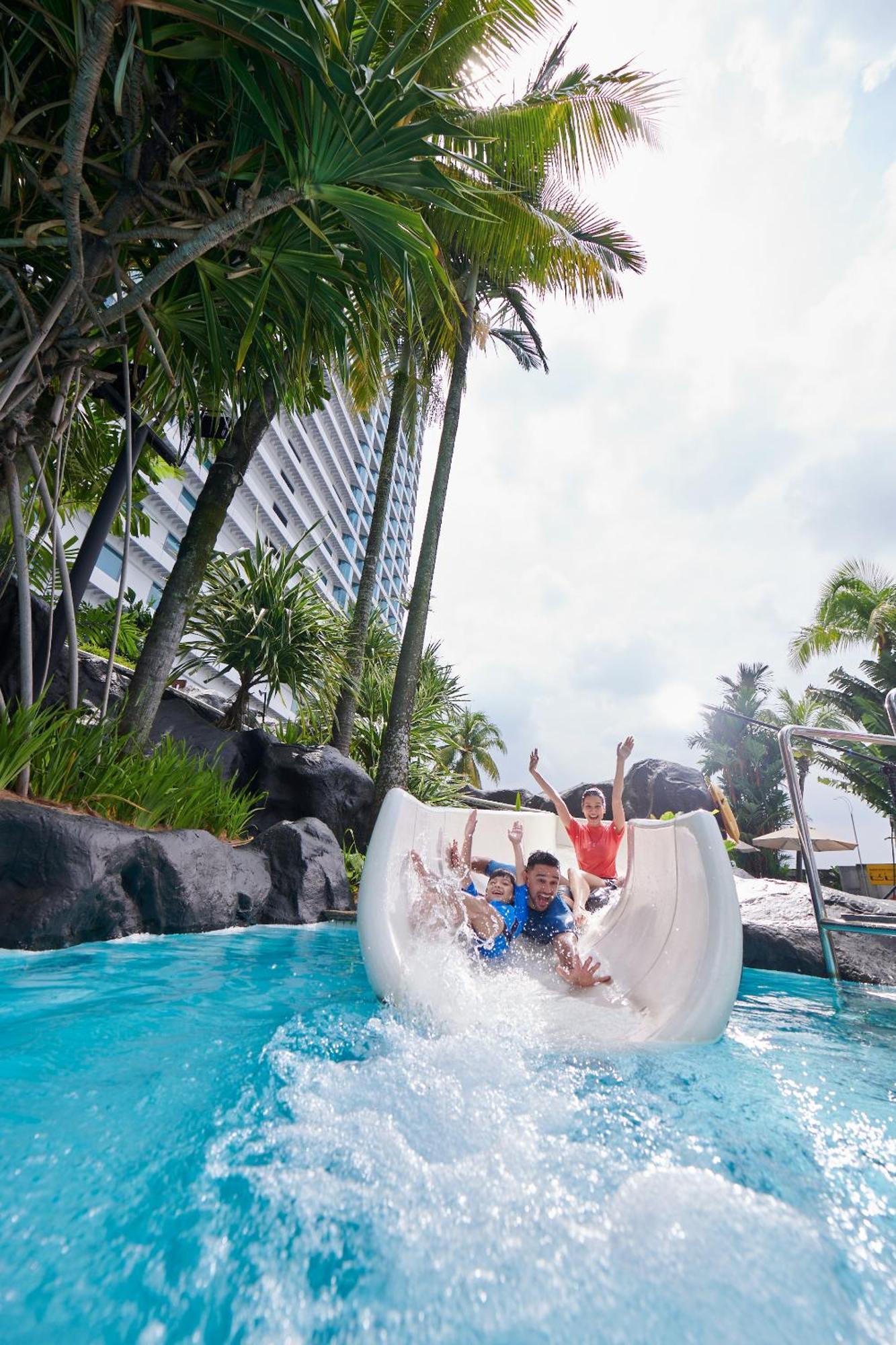 Hilton Kuala Lumpur Hotel Exterior photo Water slide at the water park